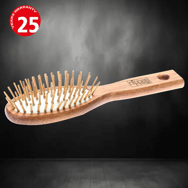 Nippes small, oval pneumatic hairbrush, with 6 rows of wooden pins, waxed beech model no H 13
