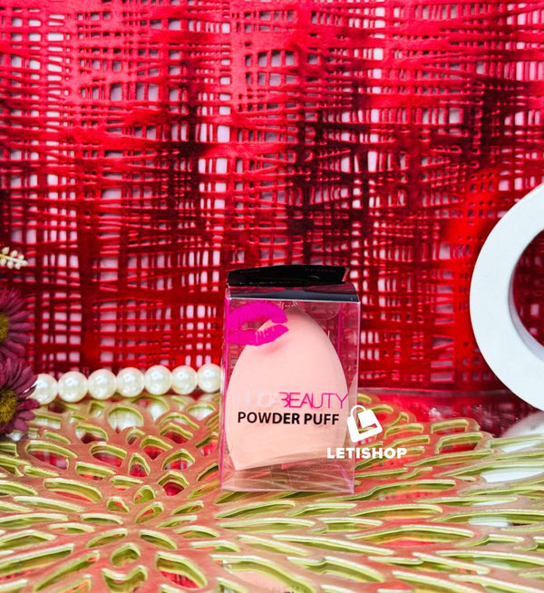 Huda beauty powder puff light cream color