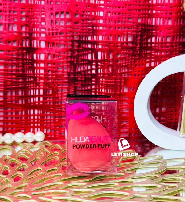 Huda beauty powder puff light pink